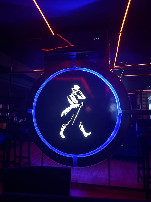Nightclub scene and neon signage captured in Tangier