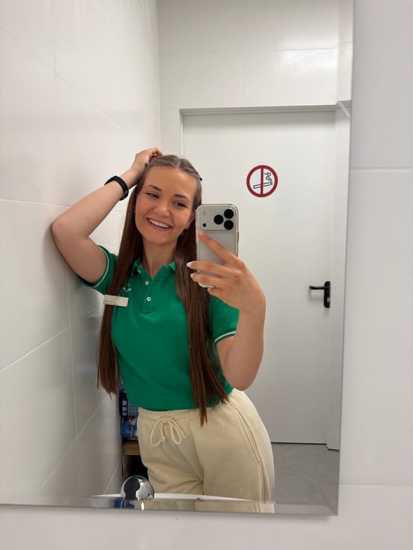 Woman takes bathroom selfie in Sofia, Bulgaria