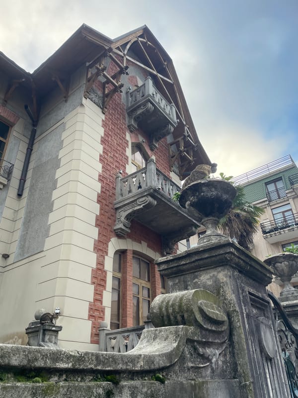 Tourist documents historic architecture and street life in Batumi