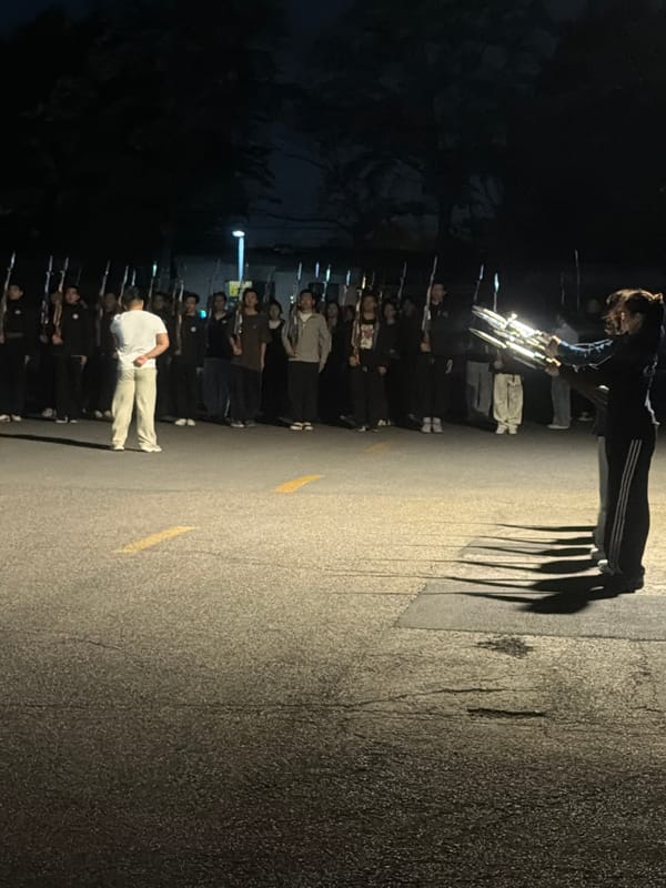 Group forms nighttime formation with objects in Zhongtun, China