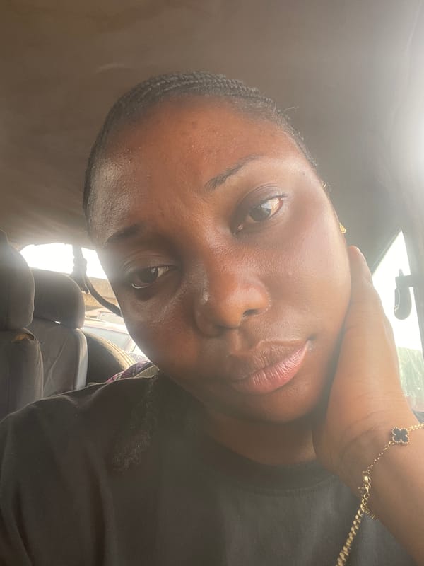 Vehicle passengers document morning street life in Nyanya Nigeria