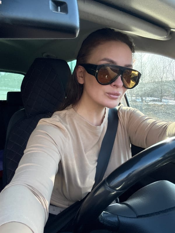 Woman sits in driver's seat in Chaikovsky, Russia