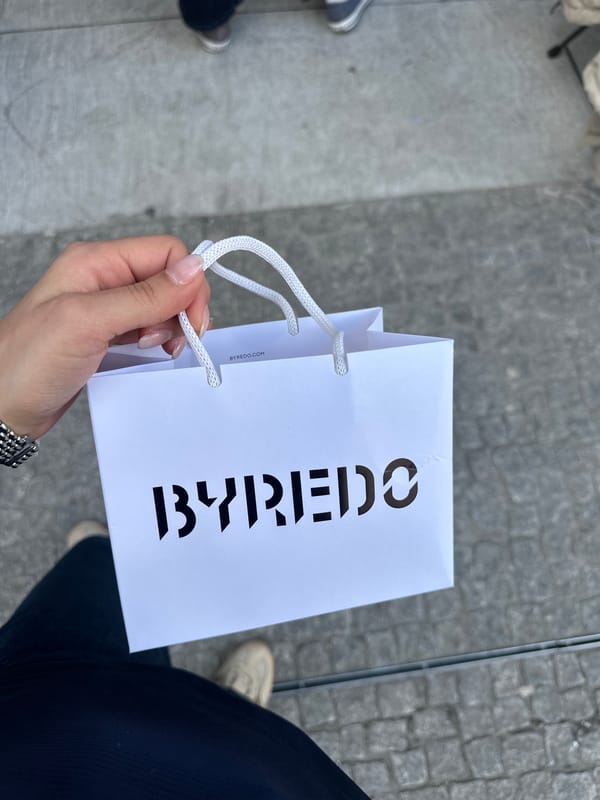 Shopper visits Byredo store, pigeons feed on Milan streets