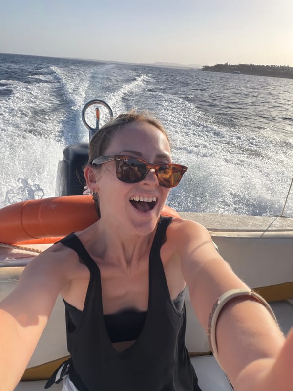 Woman takes selfie on boat in Sharm El Sheikh