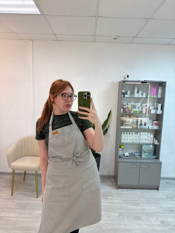 Two women take selfies in modern Chaikovsky interior