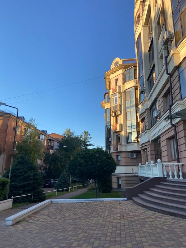 Sunny afternoon stroll through Nyzhni Mlyny's parks and streets