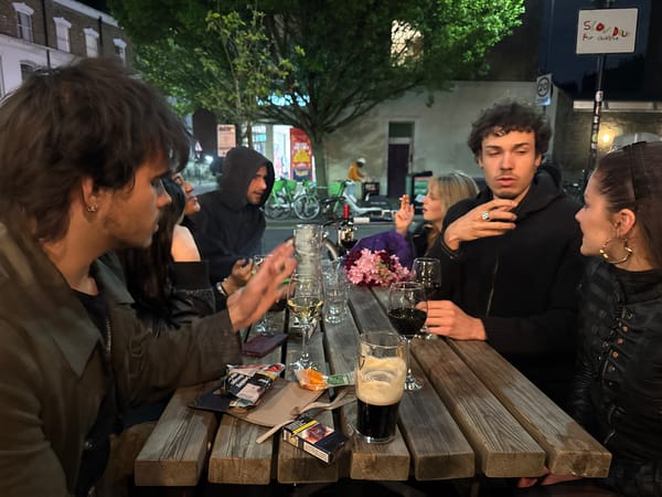 Young adults gather at outdoor London seating area