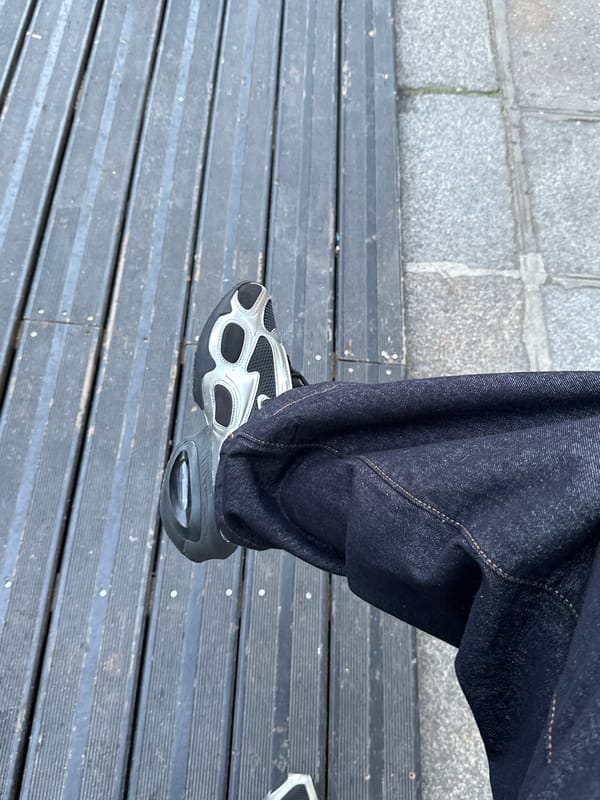 Parisians captured in routine street moments across central city