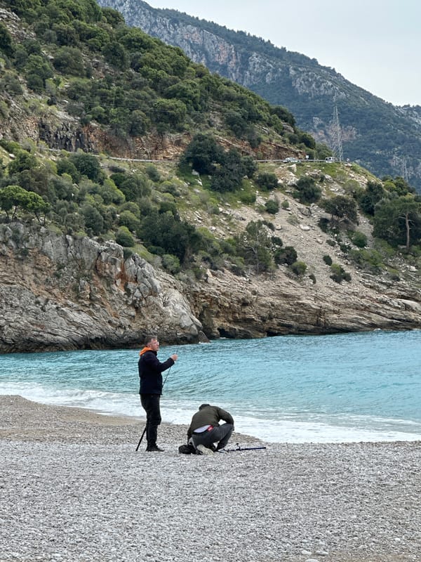 Three paragliders spotted flying through cloudy skies over Fethiye