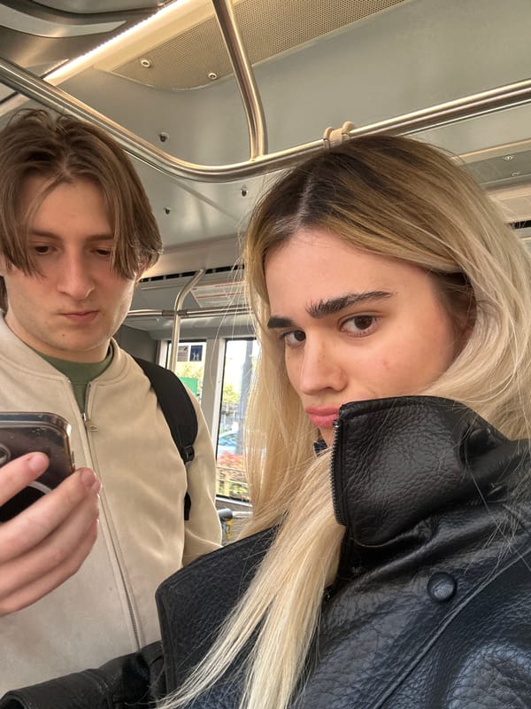 Passengers ride public transport in Milan