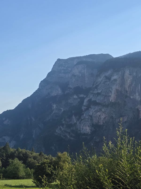 Alpine village life and mountain views in Fai della Paganella