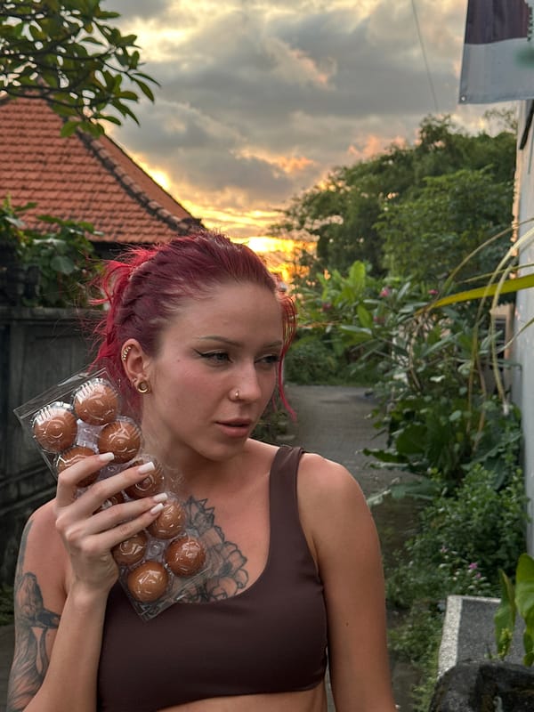 Woman enjoys morning outing with poodle in Dalung, Indonesia