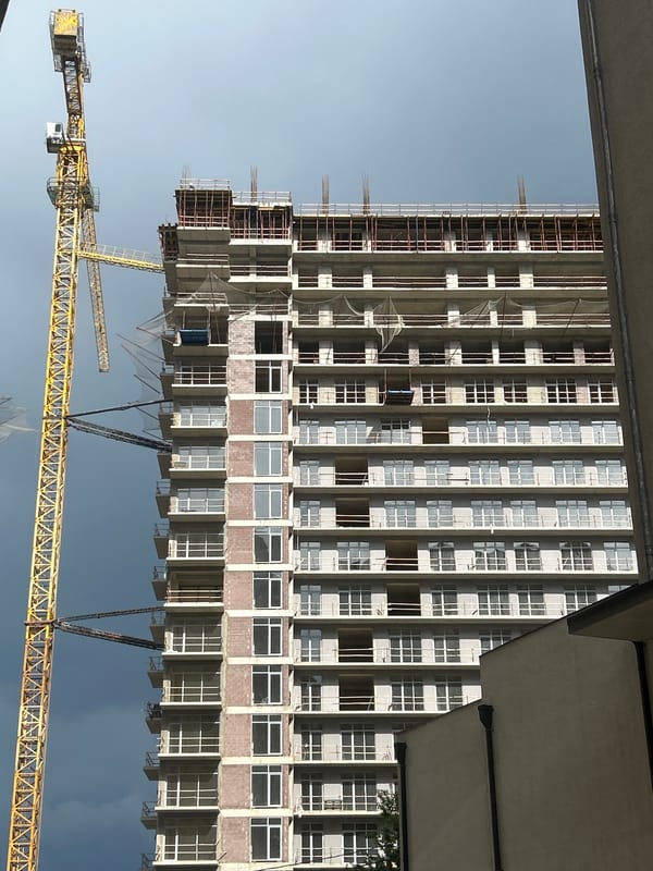 Tbilisi resident documents construction, sports displays, urban scenes