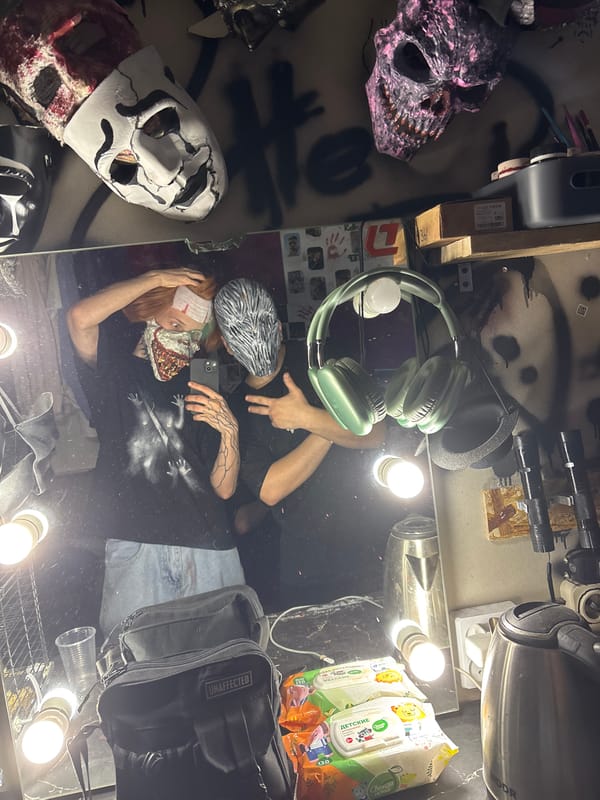 Masked person takes mirror selfie at vanity in Saratov