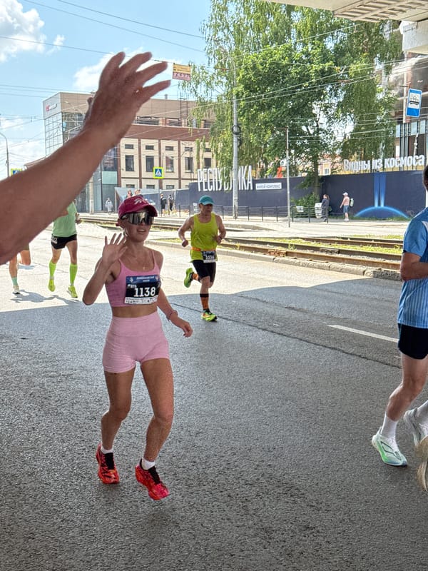 Marathon race through central Izhevsk streets on sunny morning