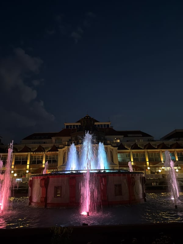 Sopot landmarks at dusk: fountains, domes, and a ship