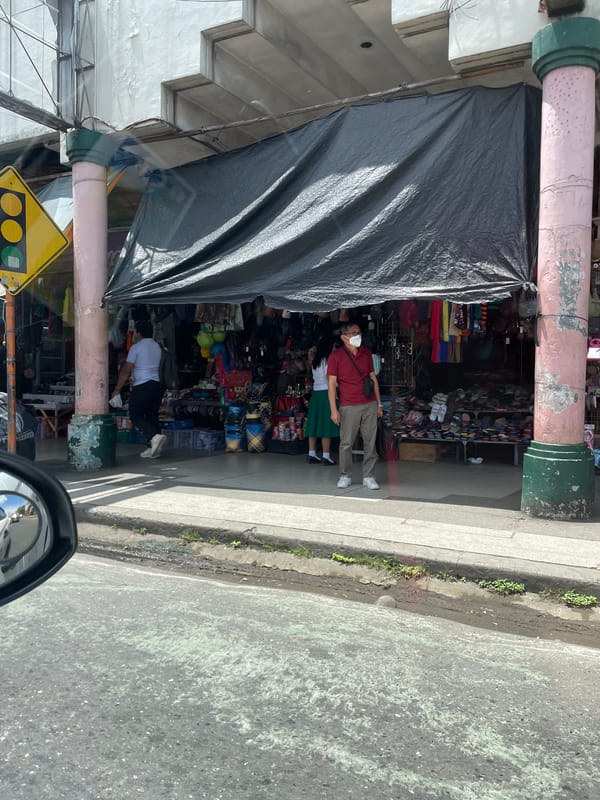 Street-level tour through Davao City markets, bridges, and traffic