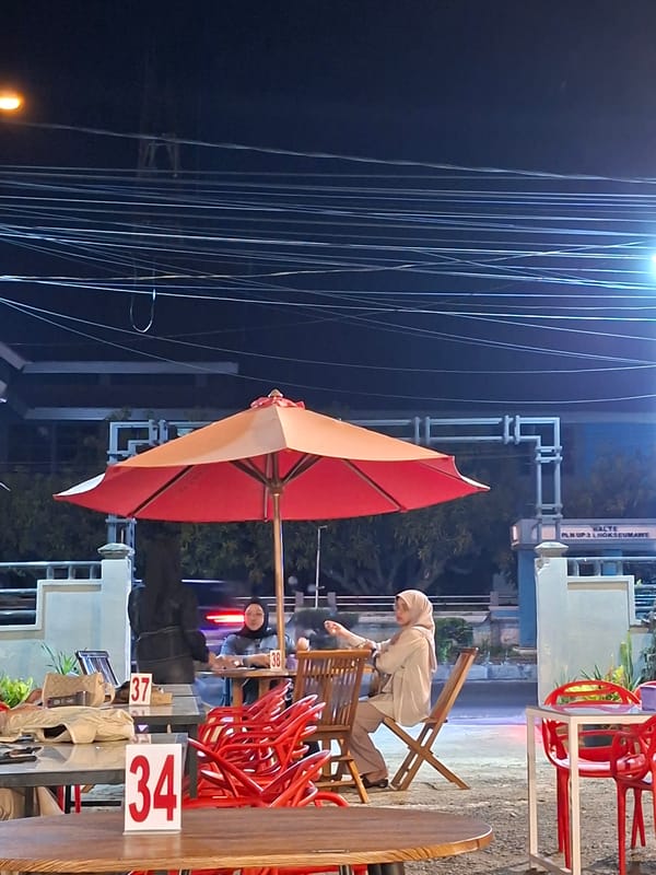 Live band performs at outdoor café in Lhokseumawe