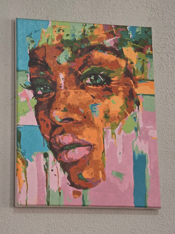 Vibrant animal head painting observed on textured wall