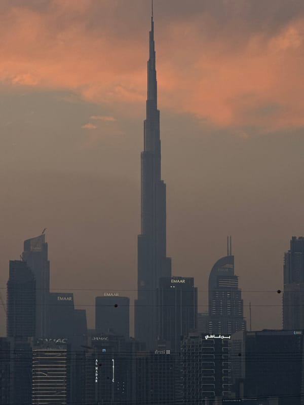 Dubai skyline and aircraft observed during golden hour