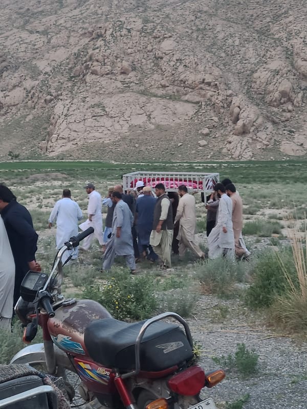 Hundreds gather at twilight in mountainous Quetta