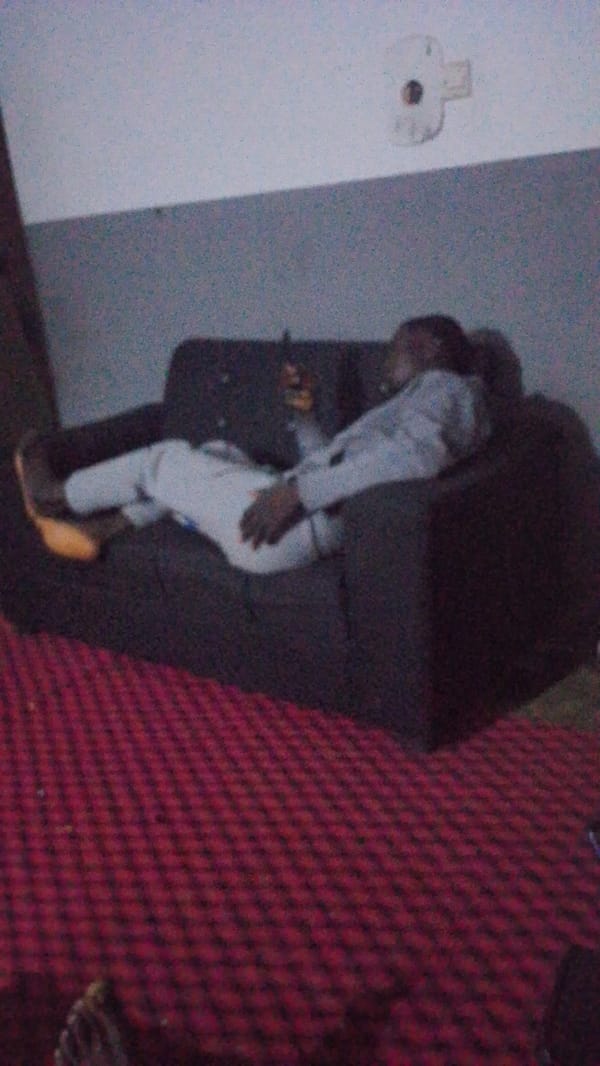 Evening domestic life captured in dimly lit living room