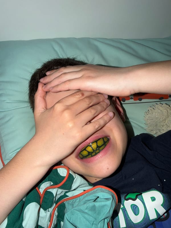 Toddler and Chihuahua play together indoors in Russian home