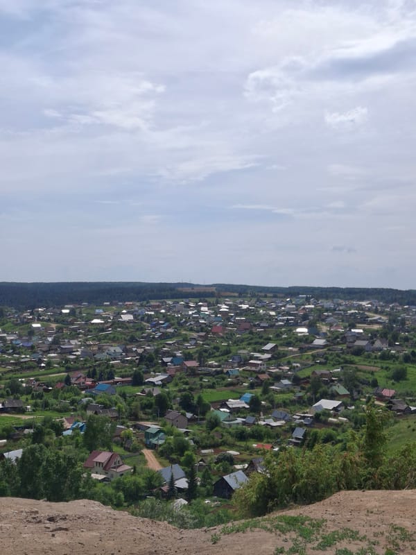 Rural Russian village landscape and river documented in morning