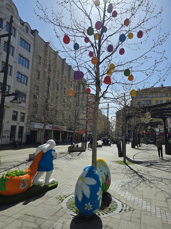 Easter decorations and flowing fountain captured in sunny Sofia