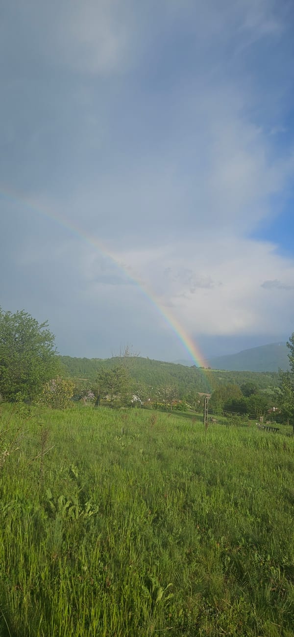Double rainbow observed over Gutsal, Bulgaria countryside