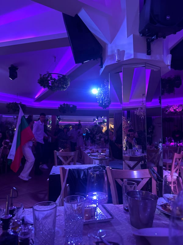 Reception event underway in Blagoevgrad hall with violet lighting