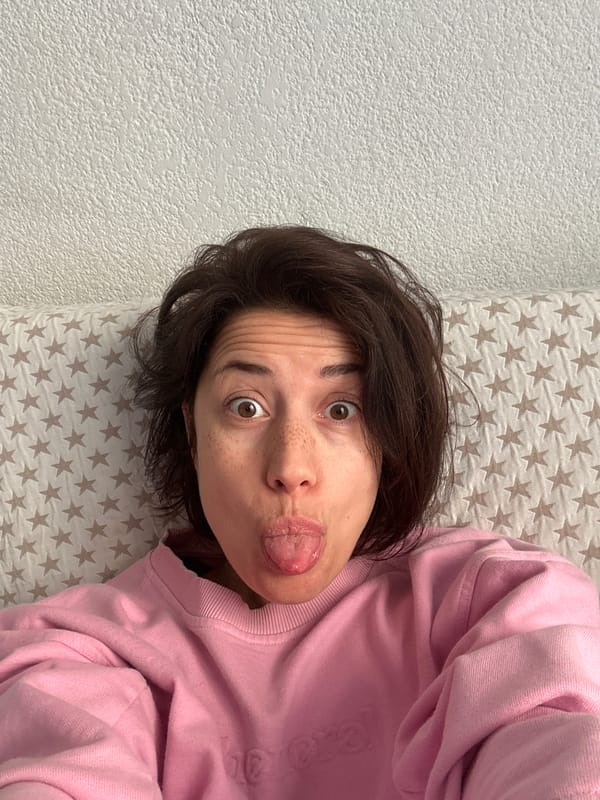 Person makes playful expression in indoor portrait, Barcelona