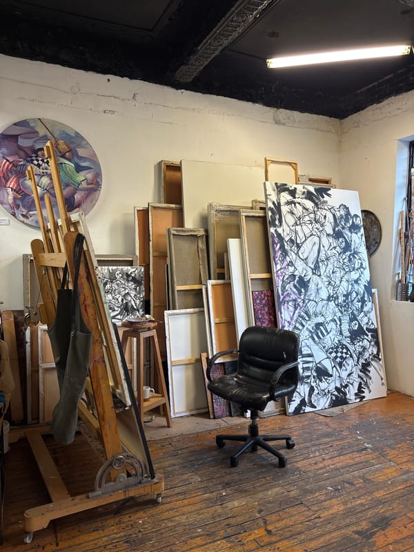 Art gallery interior documented with distinctive ceiling and displays