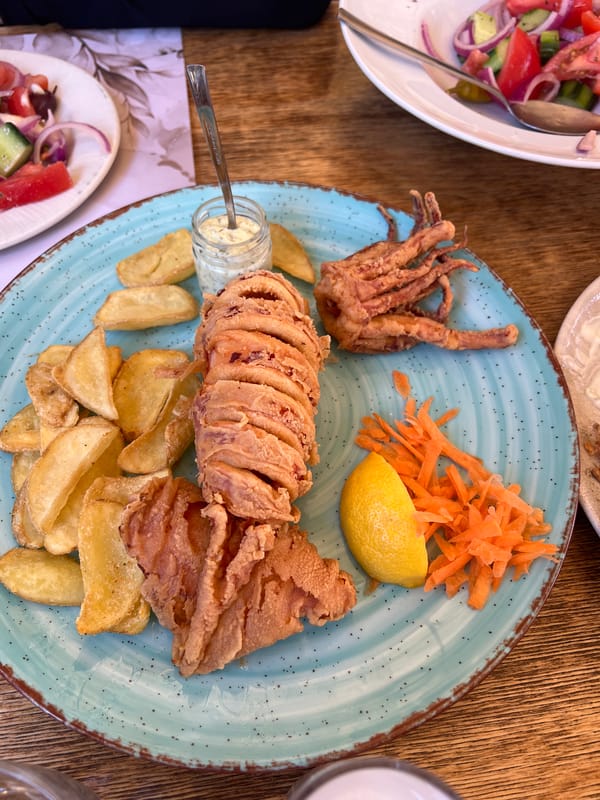 Seafood meal and wine collection documented in Xanthi, Greece