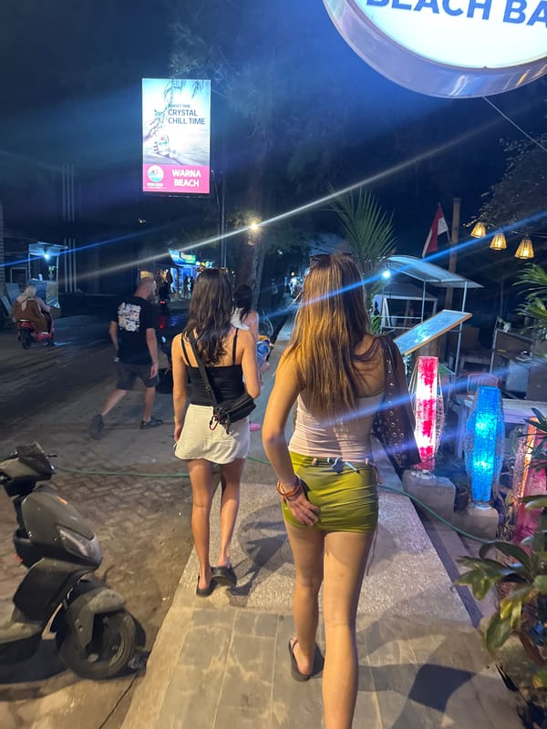 Nighttime beachside dining scene in Lombok, Indonesia