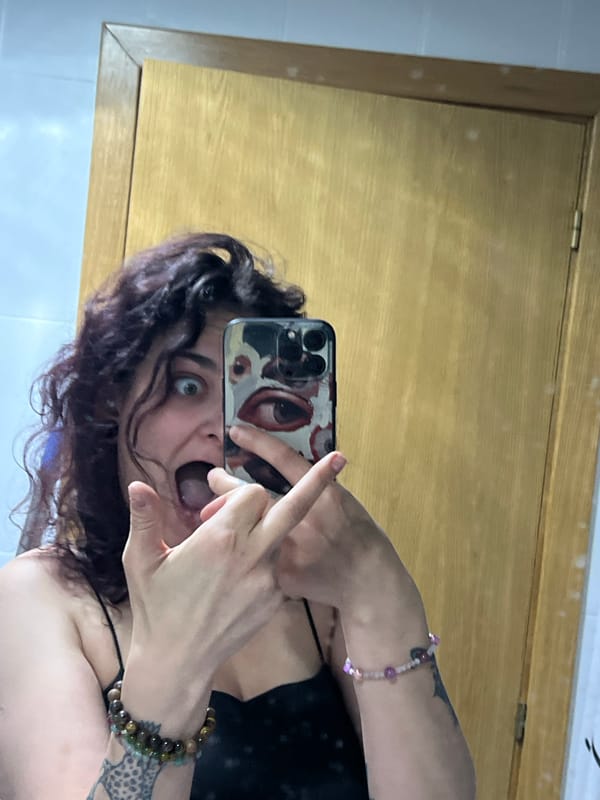 Woman takes bathroom selfies in Picassent, Spain