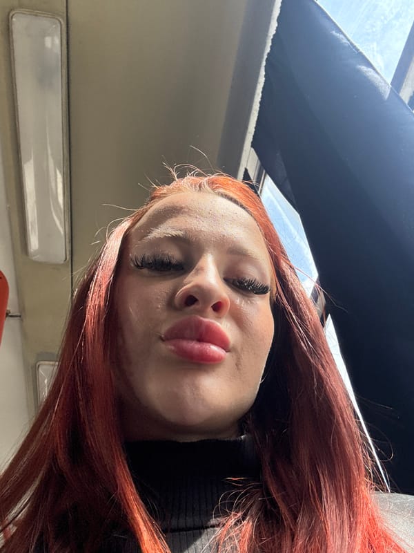 Woman takes selfie inside vehicle in Simferopol