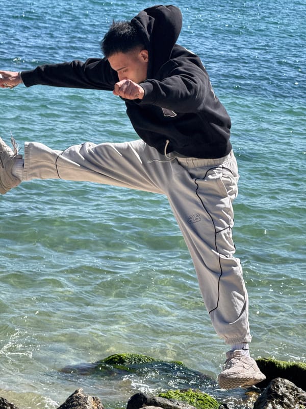 Young man performs coastal acrobatics in sunny Varna, Bulgaria