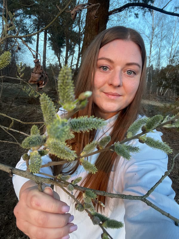 Woman poses for spring photo in Zaovrazh'e, Russia