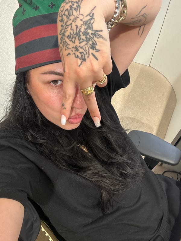 Person takes selfies in Paris retail space