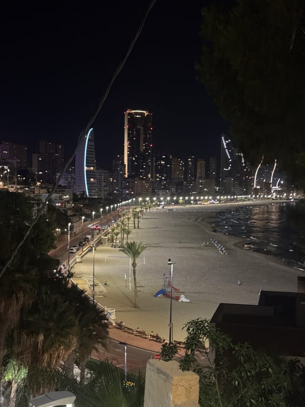 Benidorm's lit-up skyline from the waterfront at night