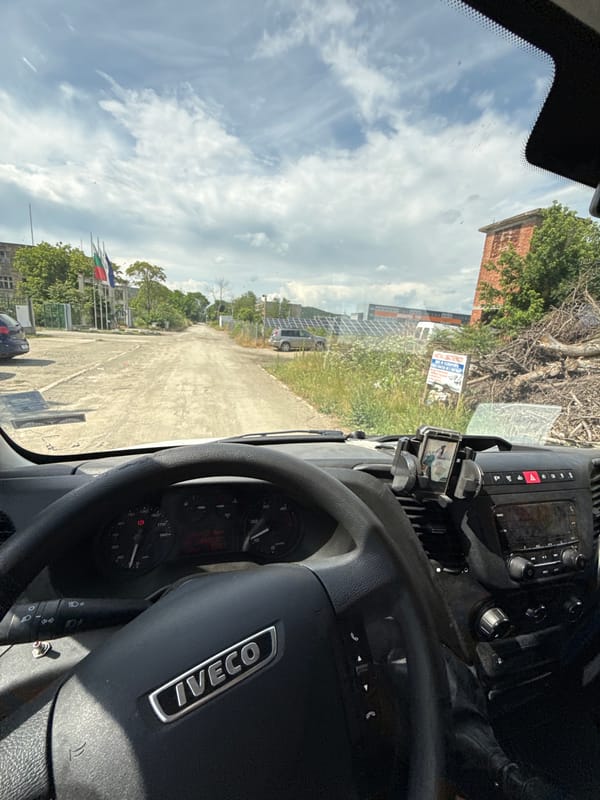 Commercial vehicle travels unpaved road in Kalitinovo, Bulgaria