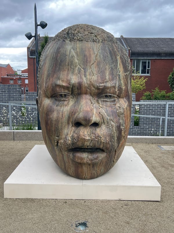 Bronze head sculptures documented near Dublin's Bord Gáis Theatre