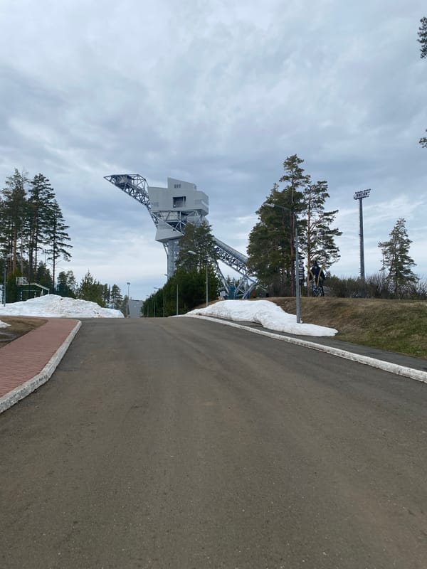 Road with ski jump visible in Прикамский, Russia
