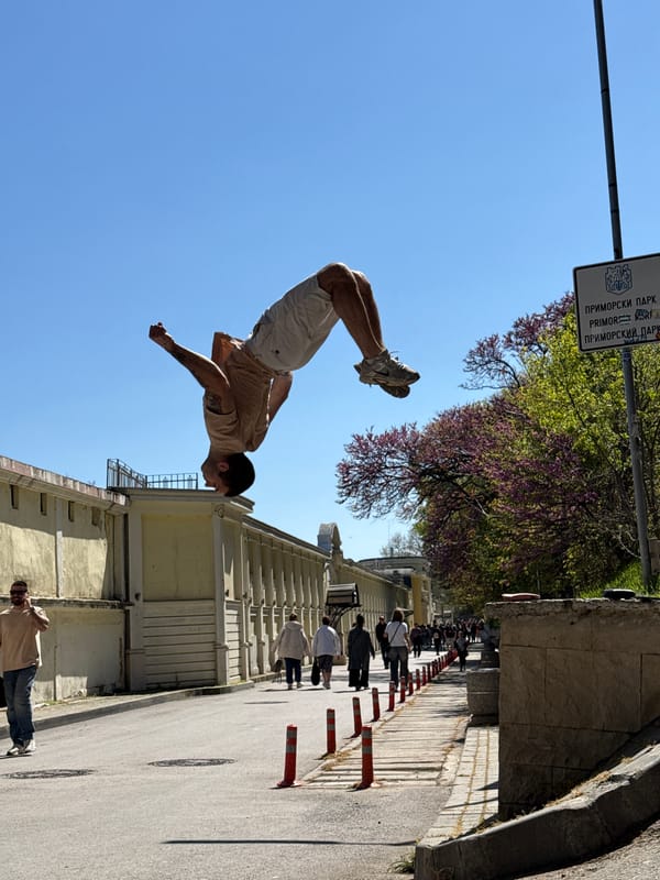 Man performs backflips in public space in Varna
