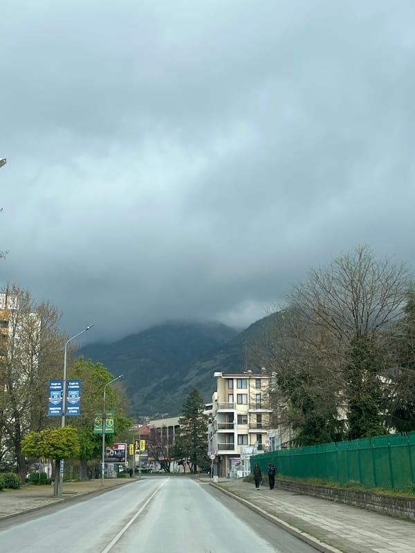 Overcast morning with wet streets observed in Karlovo, Bulgaria