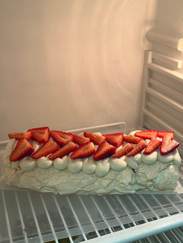 Strawberry meringue roulade prepared and served in Tel Aviv kitchen