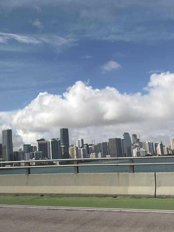Miami skyline viewed from bridge on March evening