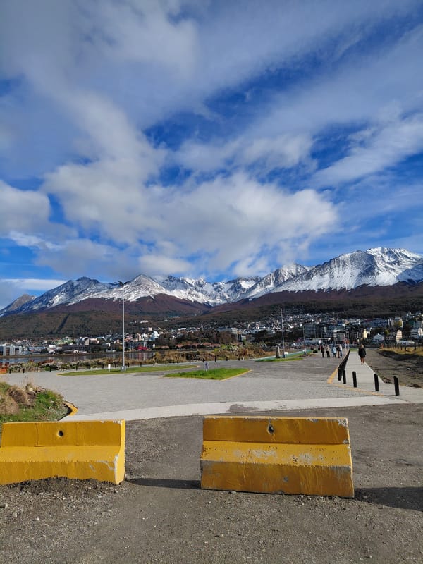 Street scene documented in Ushuaia with mountain backdrop