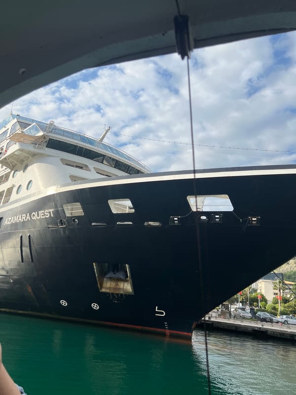 Cruise ship Azamara Quest docked in Kotor bay